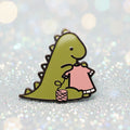 Pin's dino au tricot
