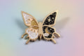 Pin's papillon doré