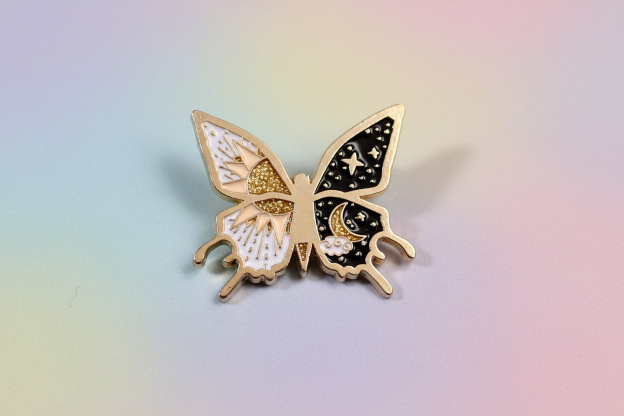 Pin's papillon doré