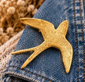 Broche Hirondelle dorée
