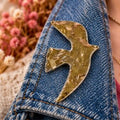 Broche oiseau dorée