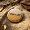 Badge rond Bordasson”, avec motif stylisé — badge seul