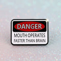Pin's -  "Danger : mouth operates..."