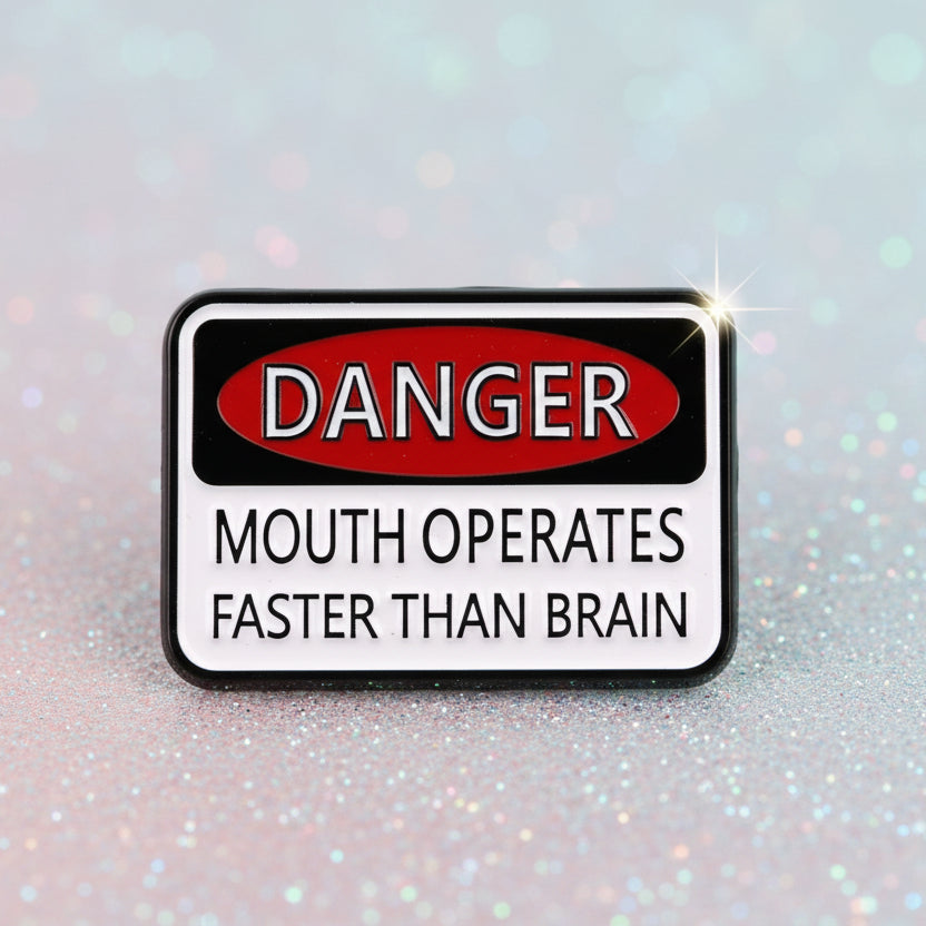 Pin's -  "Danger : mouth operates..."